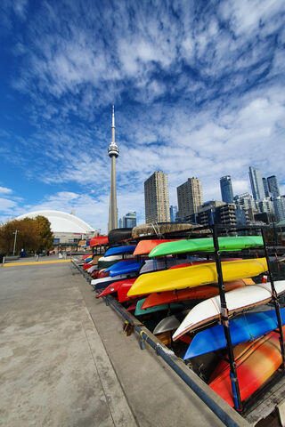 Skyward Dreams: The CN Tower and Colorful Kayaks