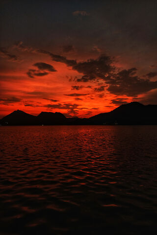 Crimson Reflections: A Serene Evening