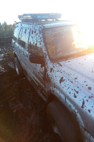 Nissan 4x4: Muddy Adventures Await! 🚙💨