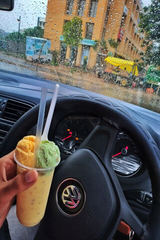 Sweet Rides and Rainy Vibes: Enjoying Ice Cream in a Volkswagen Polo 🍦🚗