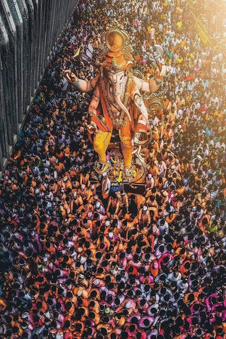 Celebrating the Divine: Ganesha's Grand Procession 🎉🙏