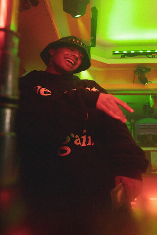 Feid: The Vibe Master in Neon Lights 🎶✨