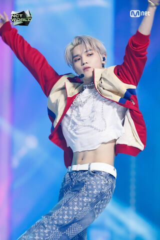 Taeyong's Dynamic Performance: A Star in Action! 🌟