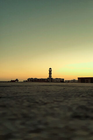 Serenity at Dusk: The Mosque's Tranquil Beauty 🌅