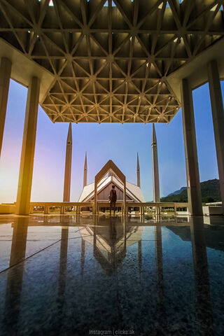 Majestic Reflections: The Faisal Mosque
