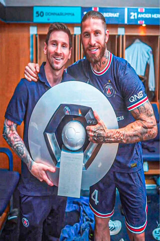 Champions of the Pitch: Messi & Ramos Celebrate Together! 🏆⚽