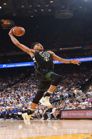 Giannis Soars: The Ultimate Dunk!