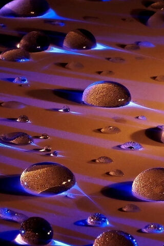 Electric Blue Drops: A Dance of Light