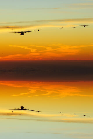 C-130: Guardians of the Skies at Dusk 🌅✈️
