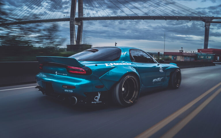Zooming into the Future: The Mazda RX-7 Wallpaper - Download to your ...