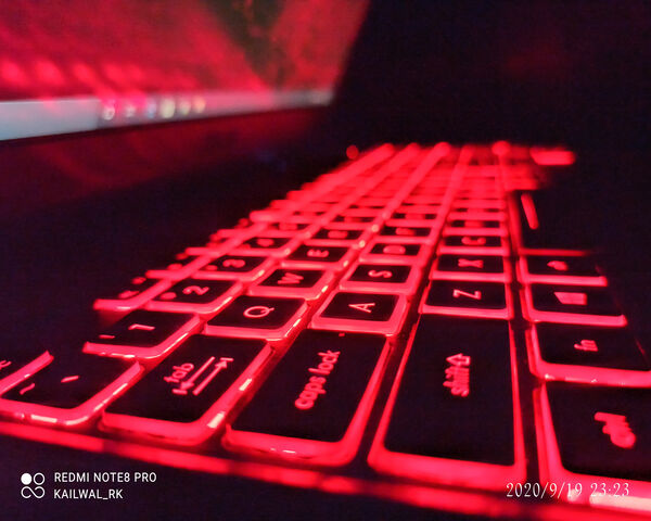 Illuminate Your Typing: The Red Pad Keyboard Wallpaper - Download to ...