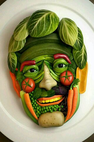 Veggie Masterpiece: A Whimsical Face of Greens! 🥦🎨