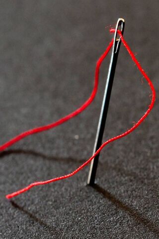 The Art of Stitching: A Thread's Journey 🧵✨