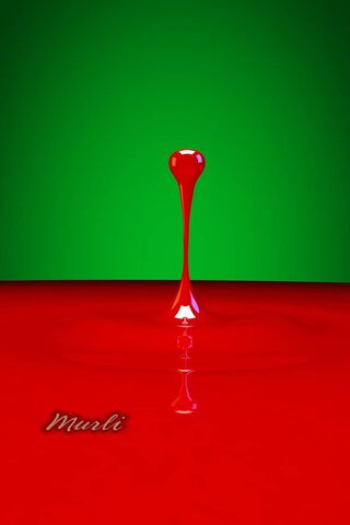 Crimson Cascade: The Art of a Drop