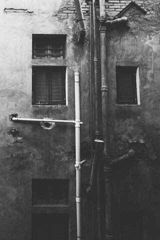 Whispers of the Past: A Glimpse Through Closed Windows