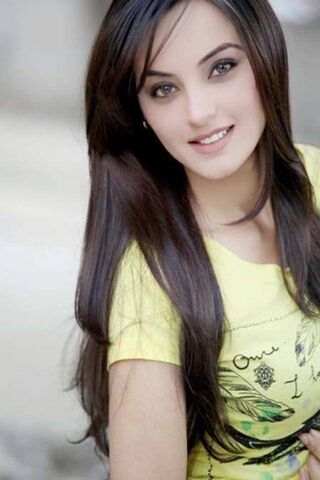 Radiant Charm: The Allure of Sadia Khan 🌟