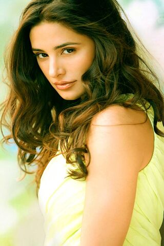 Radiant Charm: The Allure of Nargis Fakhri 🌟