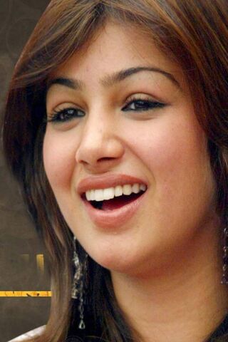 Radiant Smiles: The Charm of Ayesha Takia 🌟