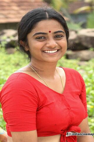 Radiant Charm: Namitha's Smile 🌟