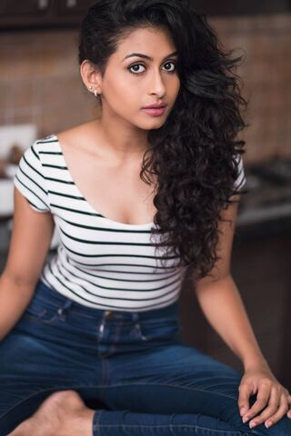 Charming Elegance: Nithya Naresh in Stripes