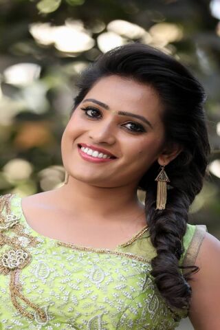 Radiant Elegance: Anusha Parda's Charming Smile