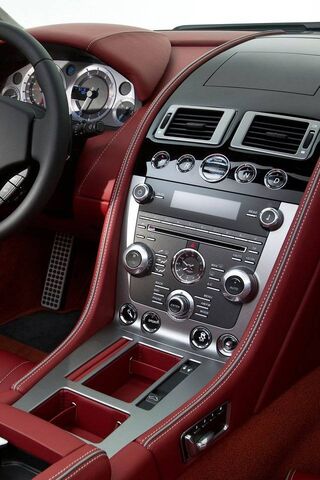 Luxury Redefined: Inside the Aston Martin DB9 🚗✨