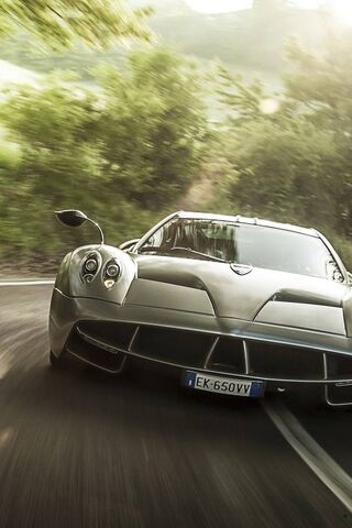 Pagani: A Symphony of Speed on the Open Road 🚗💨