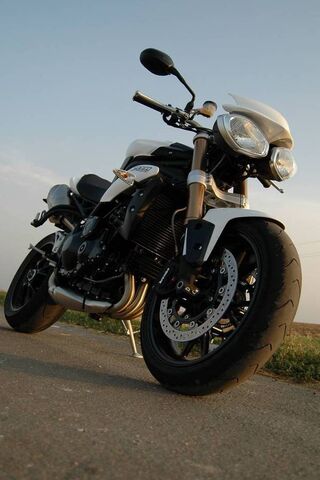 Unleashing the Beast: 2012 Speed Triple 🏍️💨