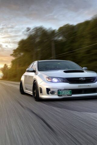 Turbocharged Adventure: The Subaru Hatchback in Motion 🚗💨
