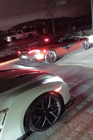 Night Showdown: GTR vs. McLaren 🏎️✨