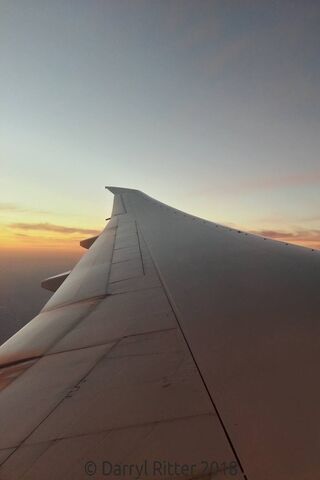 Soaring into the Sunset: The 777 Wing Experience 🌅✈️