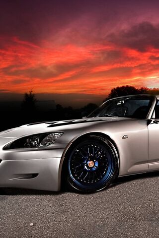 Sleek Ride Under a Sunset Sky 🌅🚗