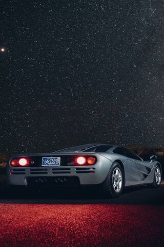 Starlit Speed: The McLaren F1 Under the Cosmos 🌌🏎️