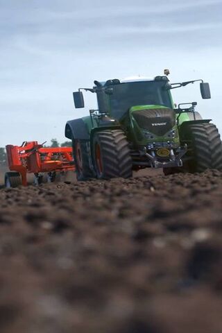 Powering the Fields: The Mighty Tractor at Work 🚜🌾