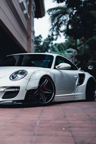 Sleek Performance: The Tuned Porsche Experience 🚗✨