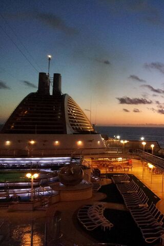 Sailing into Serenity: A Cruise Ship at Dusk 🌅🚢
