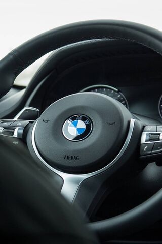 The Heart of Performance: BMW M Steering Wheel 🏎️✨