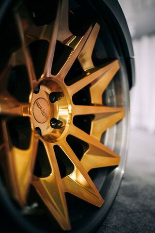 Sleek Rims: The Golden Touch