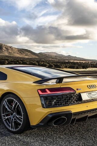 Unleashing Power: The Audi R8 V10 Plus in Stunning Yellow