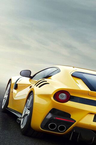 Sunshine on Wheels: The Yellow Ferrari