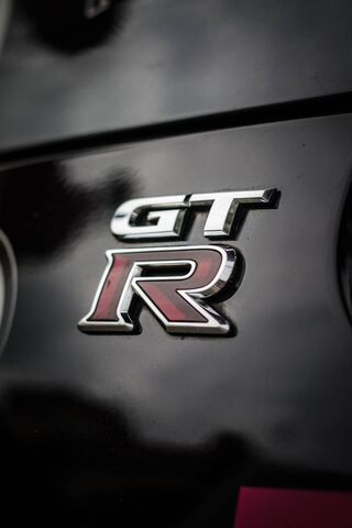 The Iconic GT-R Emblem:..