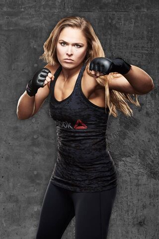 Unstoppable Force: Ronda Rousey in Action 💪