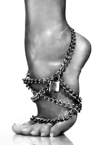 Elegance in Chains: The Art of Leg Woman