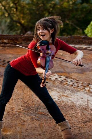 Dancing with the Violin: Lindsey Stirling in Action! 🎻✨