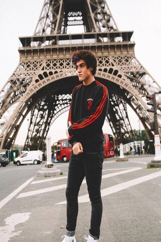 Ethan Dolan: A Stroll Under the Eiffel Tower 🌍✨