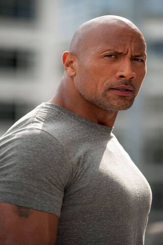 The Rock: Strength and Charisma Unleashed 💪✨