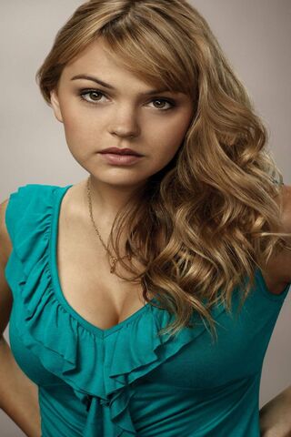 Radiant Charm: Aimee Teegarden's Captivating Presence