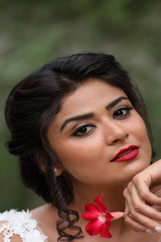 Elegance in Bloom: Priyanka Sharma's Captivating Portrait