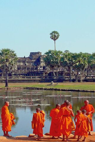 Harmony in Orange: Young Monks at Angkor Wat