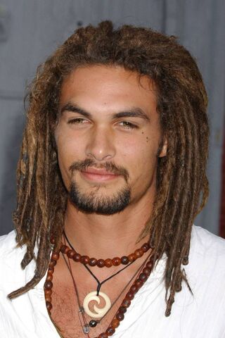 The Charismatic Presence of Jason Momoa 🌊✨